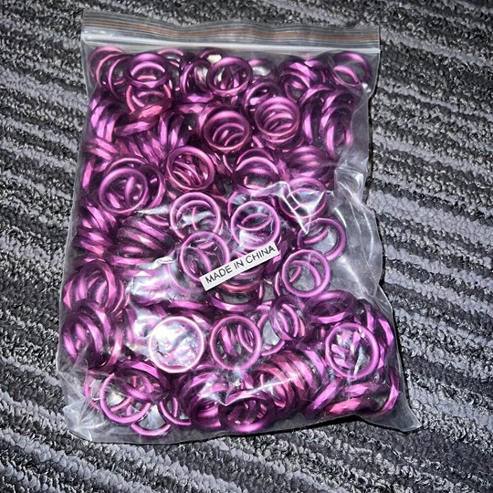 Purple metallic plastic circles for jewelry, crafting and art projects